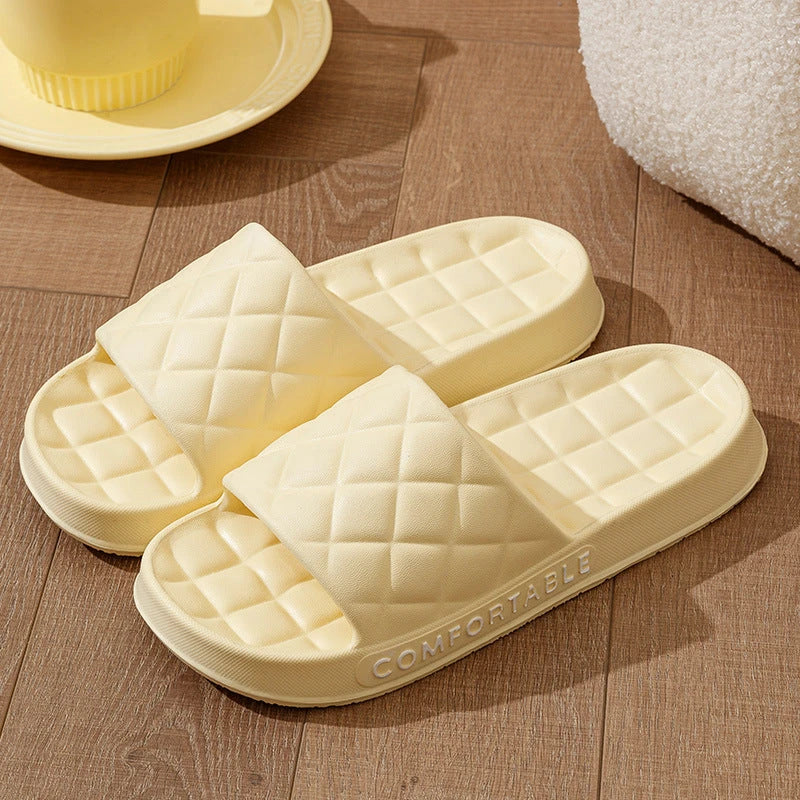 Cozy plaid indoor slippers with soft, silent, and waterproof EVA construction for comfortable all-day wear