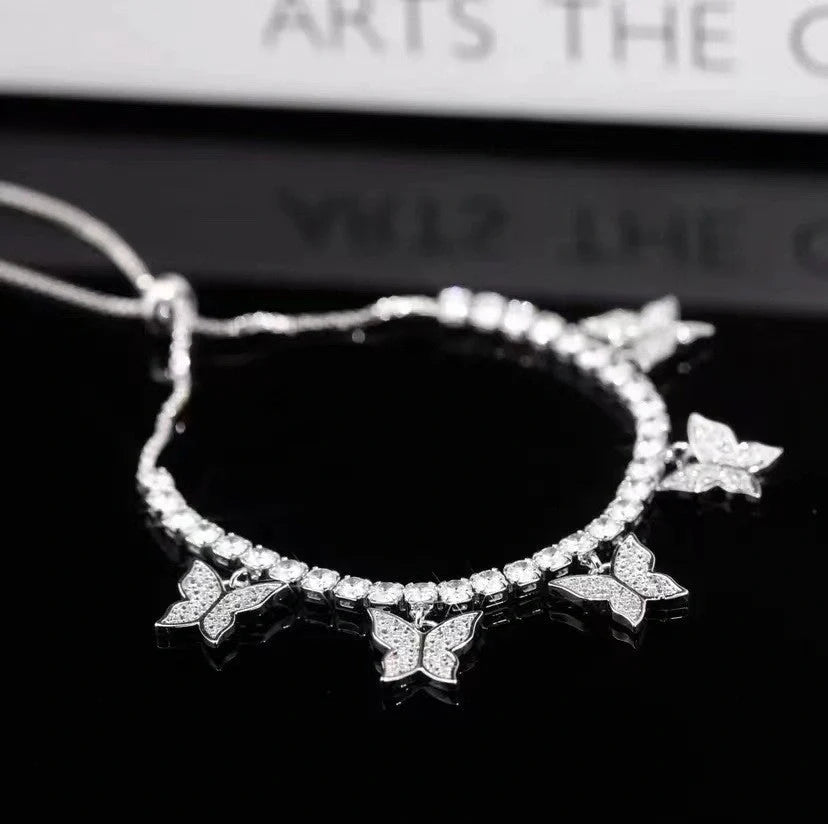 Adjustable Multi Butterfly Bracelet with zircon stones on a heart-shaped copper band