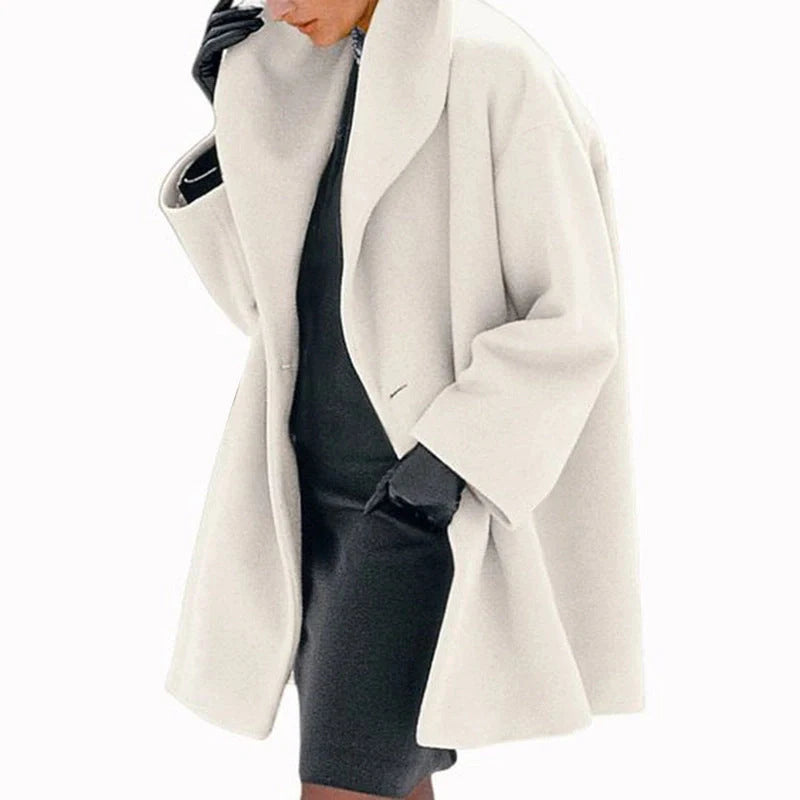 A stylish woollen coat in a variety of vibrant colours, perfect for the autumn and winter seasons.