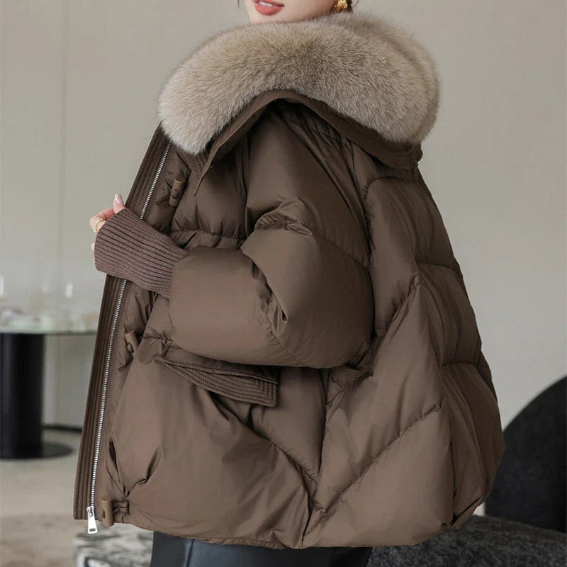Premium down-filled puffer jacket with faux fur collar, available in brown, black, and white colours
