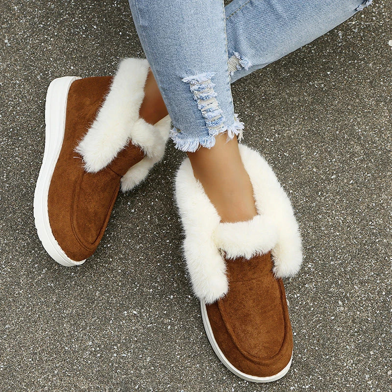 Warm plush ankle boots with suede uppers and artificial fur lining, available in black, grey, and brown colors.