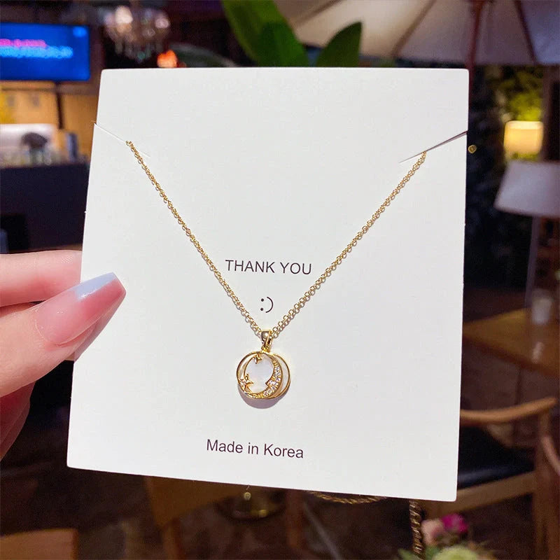 Design Star Moon Mother Shell Pendant Necklace in gold, silver, and copper options
