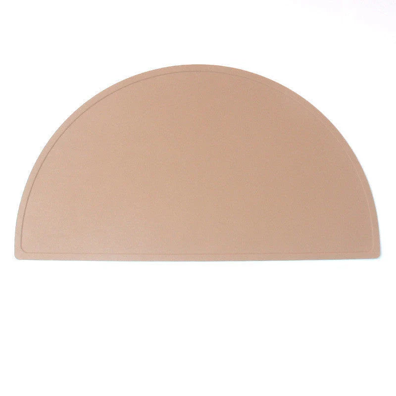 Durable silicone placemat in various colors, featuring waterproof and stain-resistant properties for easy cleaning