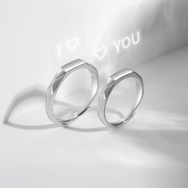 Stylish sterling silver rings with a hidden love pattern design, perfect for romantic gifts or personal accessorizing.
