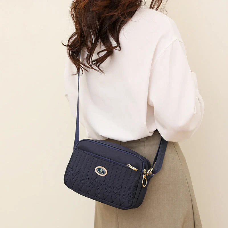 Women's lightweight nylon cross body messenger bag in various colours