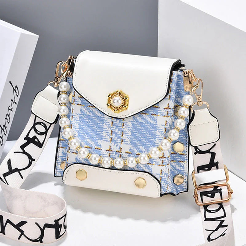 Premium crossbody phone bag with elegant pearl charm, made of durable PU leather and available in multiple color options