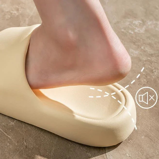 Comfortable EVA foam slip-on slippers in various colors, featuring non-slip soles and a breathable design for indoor and bathroom use.