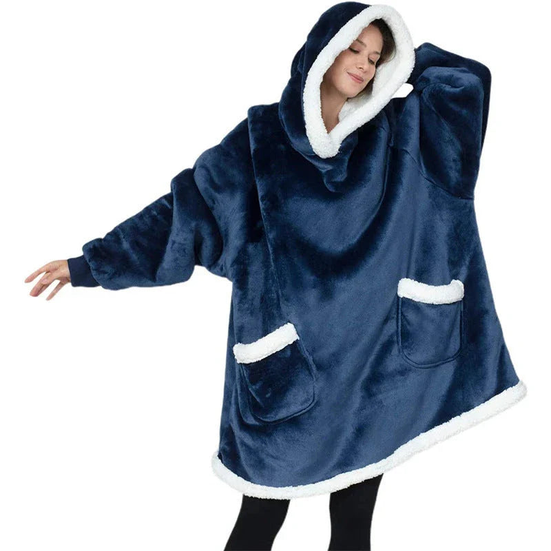 Comfy oversized TV hoodie blanket in various stylish colors, perfect for cozy movie nights and relaxation at home.
