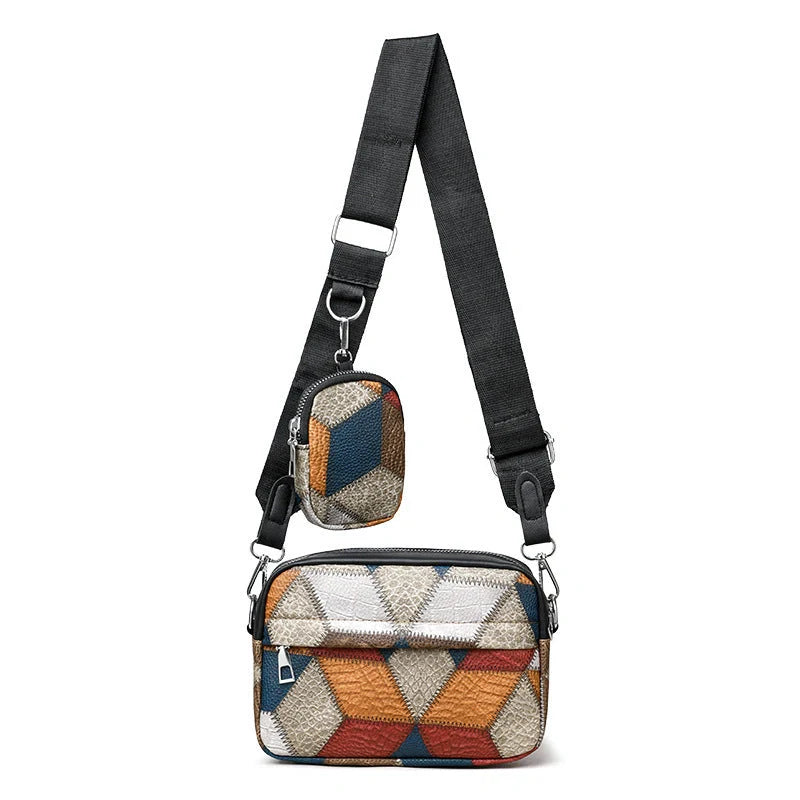 Retro-inspired satchel bag with contrasting black and yellow colour design, made of premium PU leather material