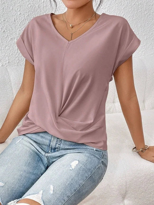 Stylish short-sleeve ladies' t-shirt with unique knot detail, available in a range of vibrant colours