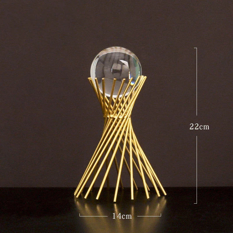 Elegant crystal ball home decor ornaments with a luxurious golden metal finish and minimalist modern design