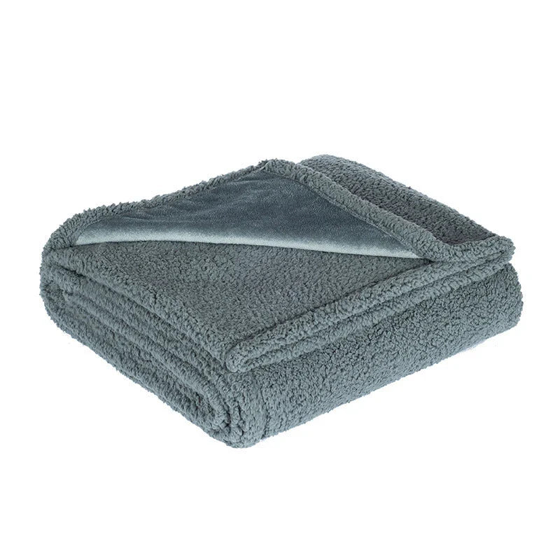 Plush Sherpa Pet Blanket in various colors and sizes, designed for comfort and warmth for your furry friend