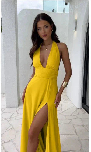 Chic backless halter neck slit dress in various colors, including pink, white, blue, black, and yellow