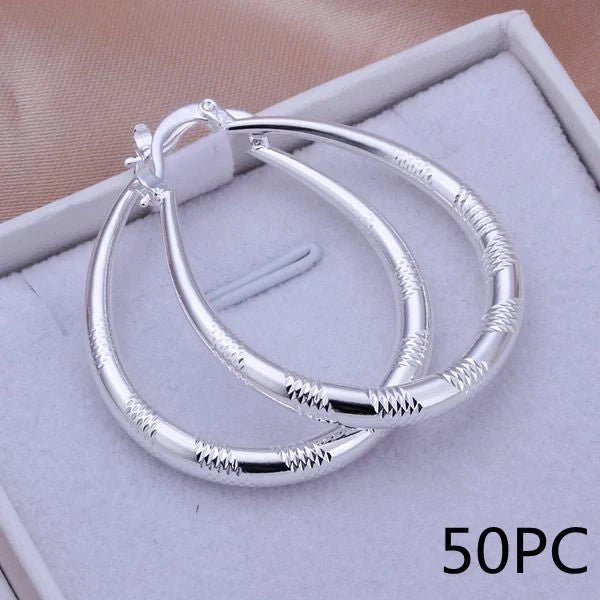 Stylish silver hoop earrings with a unique blend of European and American design, crafted from premium copper and 925 sterling silver plating