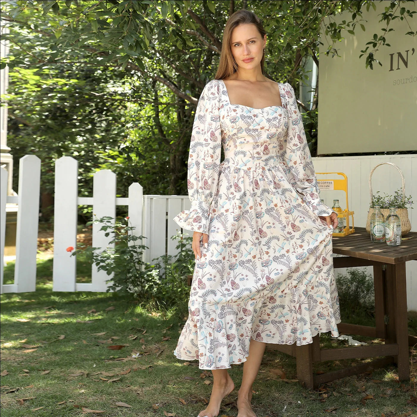 Stylish women's floral print dress with square neckline and long sleeves, available in multiple sizes