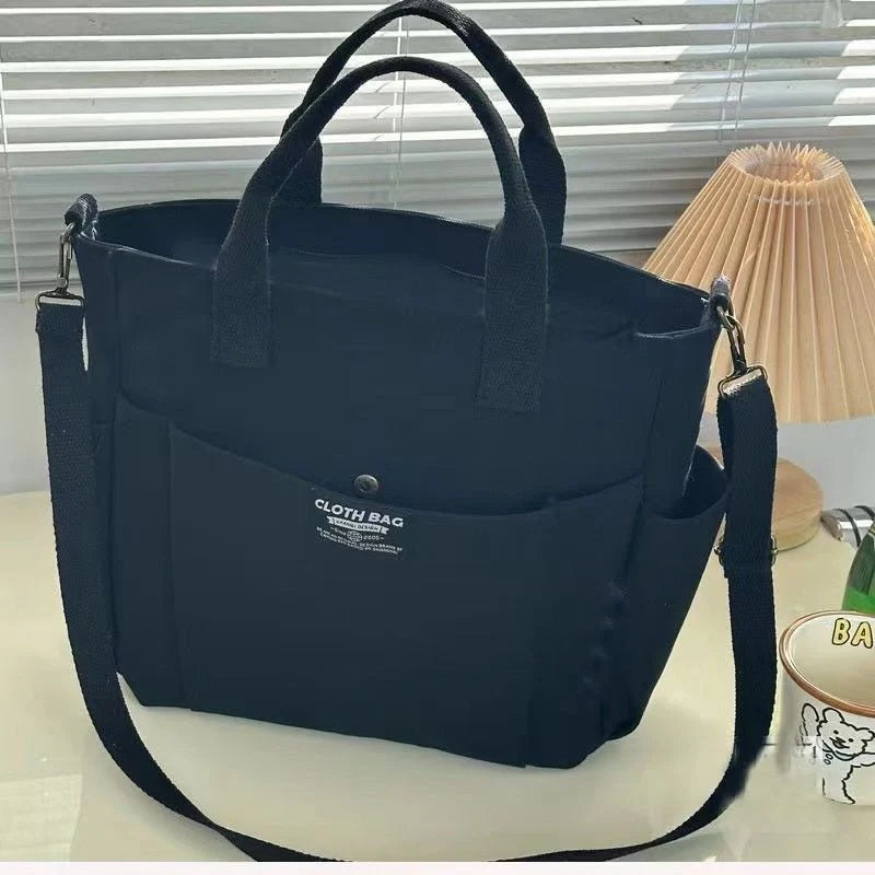 Stylish Spacious Canvas Shoulder Bag for daily commute in khaki, black, beige, and black corduroy style