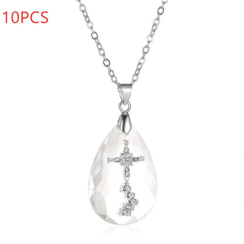 Elegant white drop pendant necklace with cross-chain design, made of premium electroplated alloy for a timeless and sophisticated look.