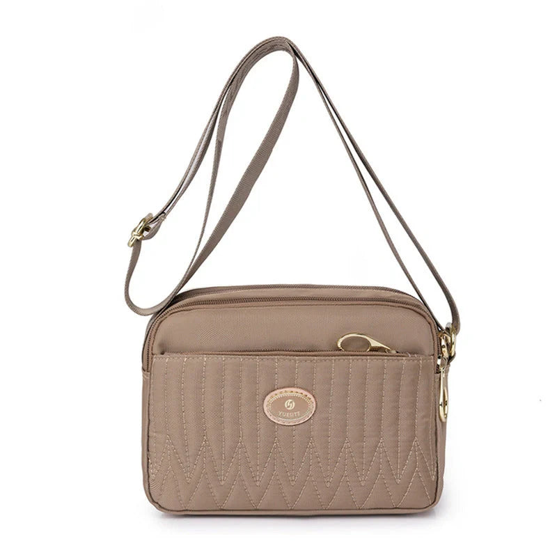 Women's lightweight nylon cross body messenger bag in various colours