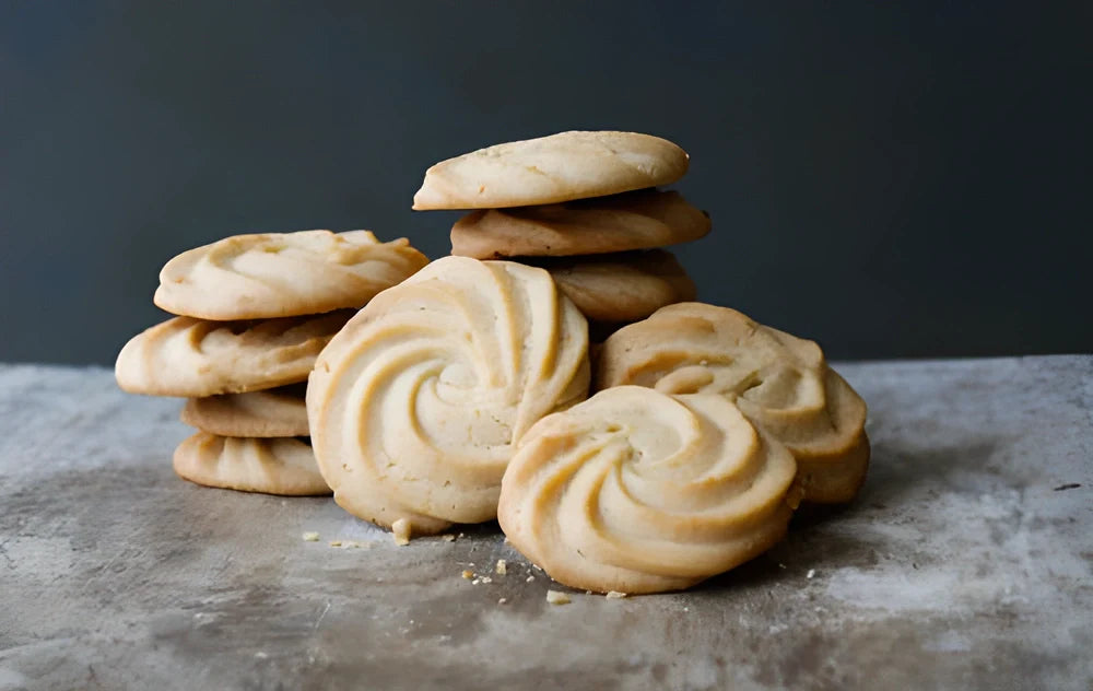 Easy Cookie Press with 13 disc designs and 8 piping tips for making perfect spritz cookies