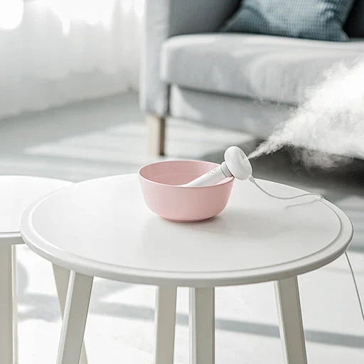 Compact and portable USB-powered air humidifier and essential oil diffuser with versatile water container design