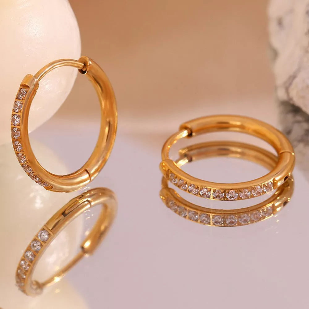 Women's titanium steel rounded edge zircon earrings in gold and steel finishes