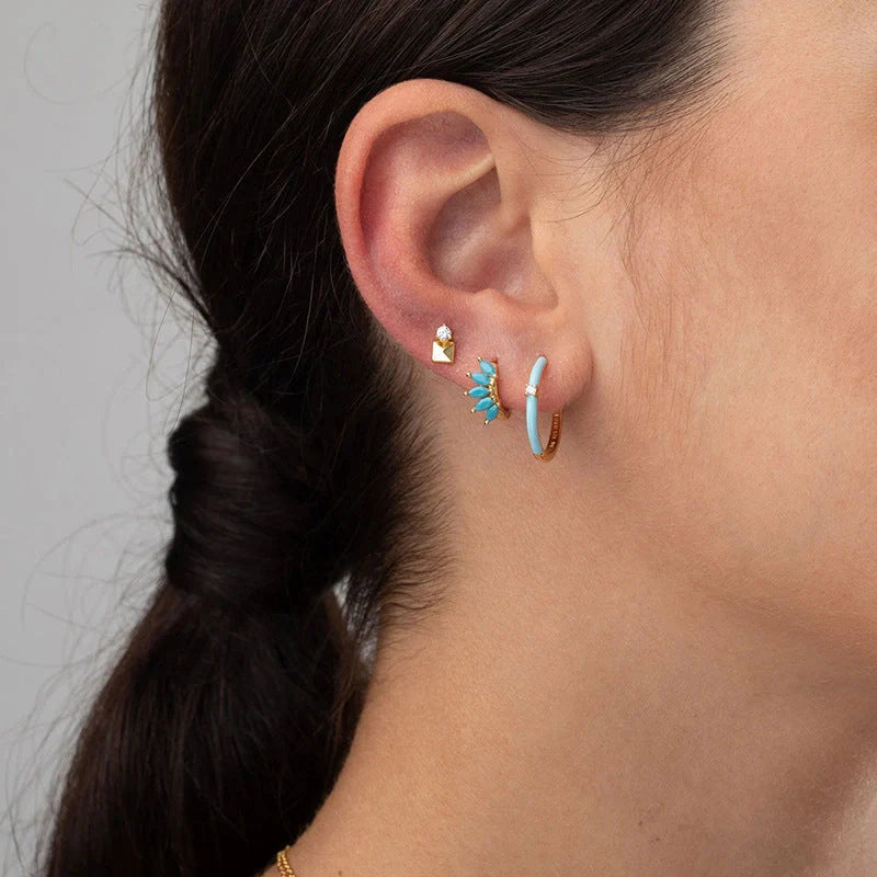 Elegant British-inspired Horse Eye Stone Earrings with a mesmerising symmetrical design and premium precious stones