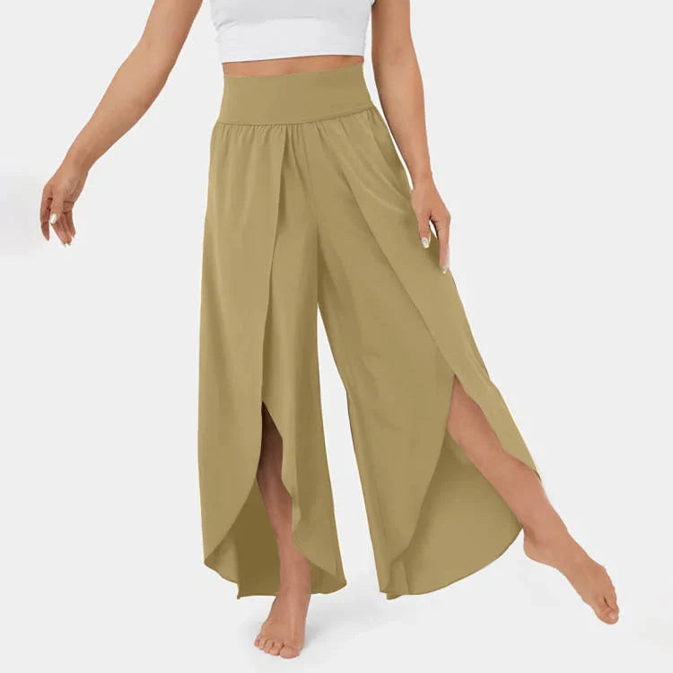 Versatile high-waist split-leg yoga trousers in a variety of colours, featuring a wide-leg silhouette and elasticated waistband for comfort and style.
