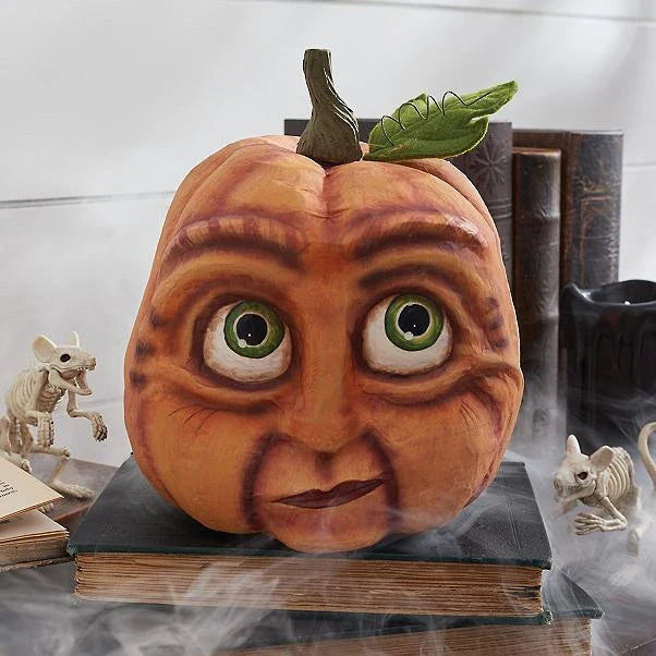 A collection of hand-crafted pumpkin decorations in various sizes, perfect for adding an enchanting touch to your Halloween celebrations.