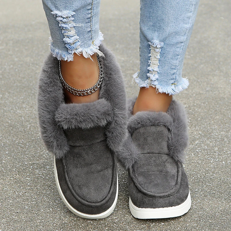 Warm plush ankle boots with suede uppers and artificial fur lining, available in black, grey, and brown colors.