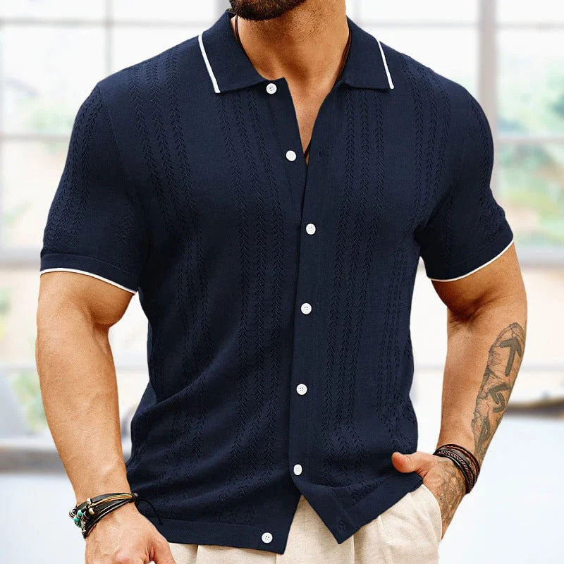 Stylish short-sleeved polo shirt with unique flocked design, available in a variety of rich colors for versatile summer style