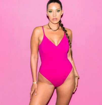 Stylish backless one-piece swimsuit in various vibrant colors for curvy women