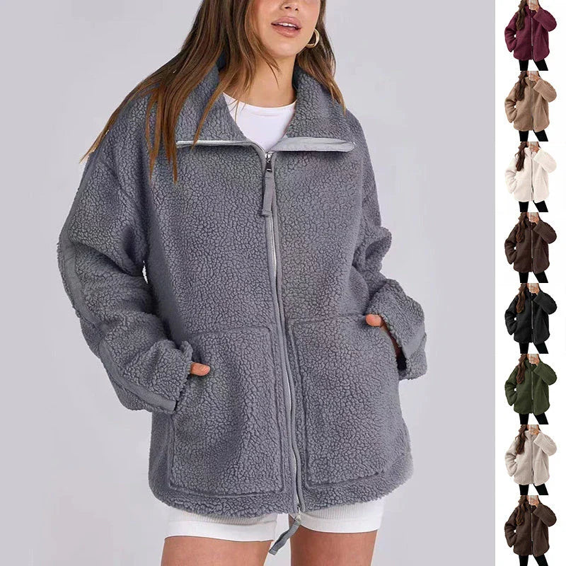 Classic padded fleece jacket in various colours for women, featuring a zip-up design and pockets