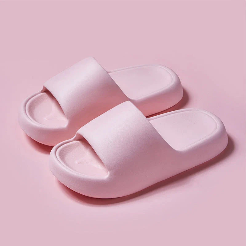 Comfortable EVA foam slip-on slippers in various colors, featuring non-slip soles and a breathable design for indoor and bathroom use.