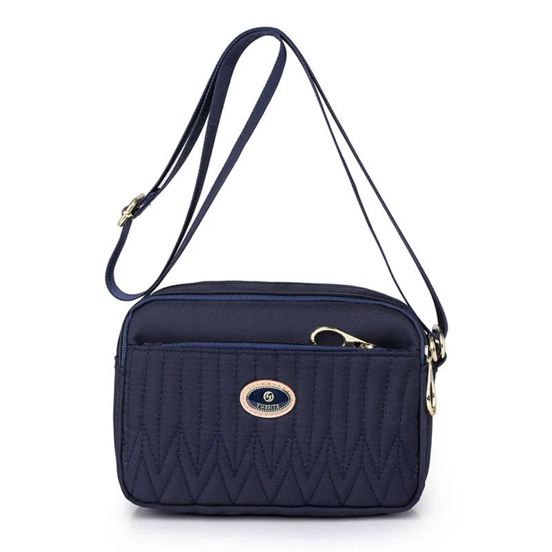 Women's lightweight nylon cross body messenger bag in various colours