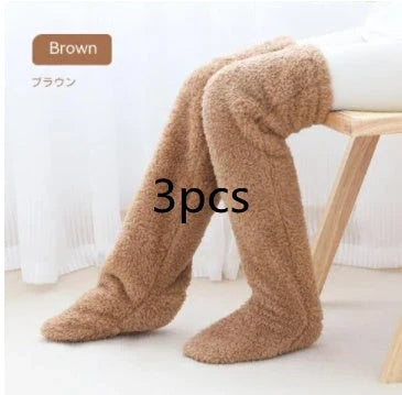 Cozy over-the-knee fuzzy socks in various colors, including brown, blue, dark gray, and pink purple