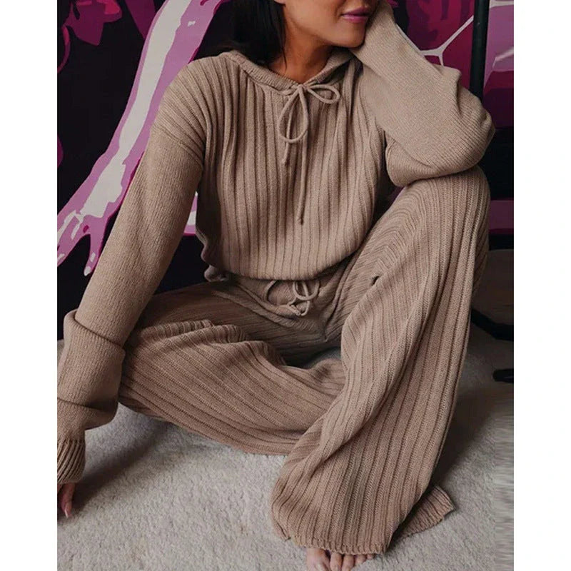 Cozy hooded two-piece loungewear set with soft, stretchy fabric and relaxed silhouette