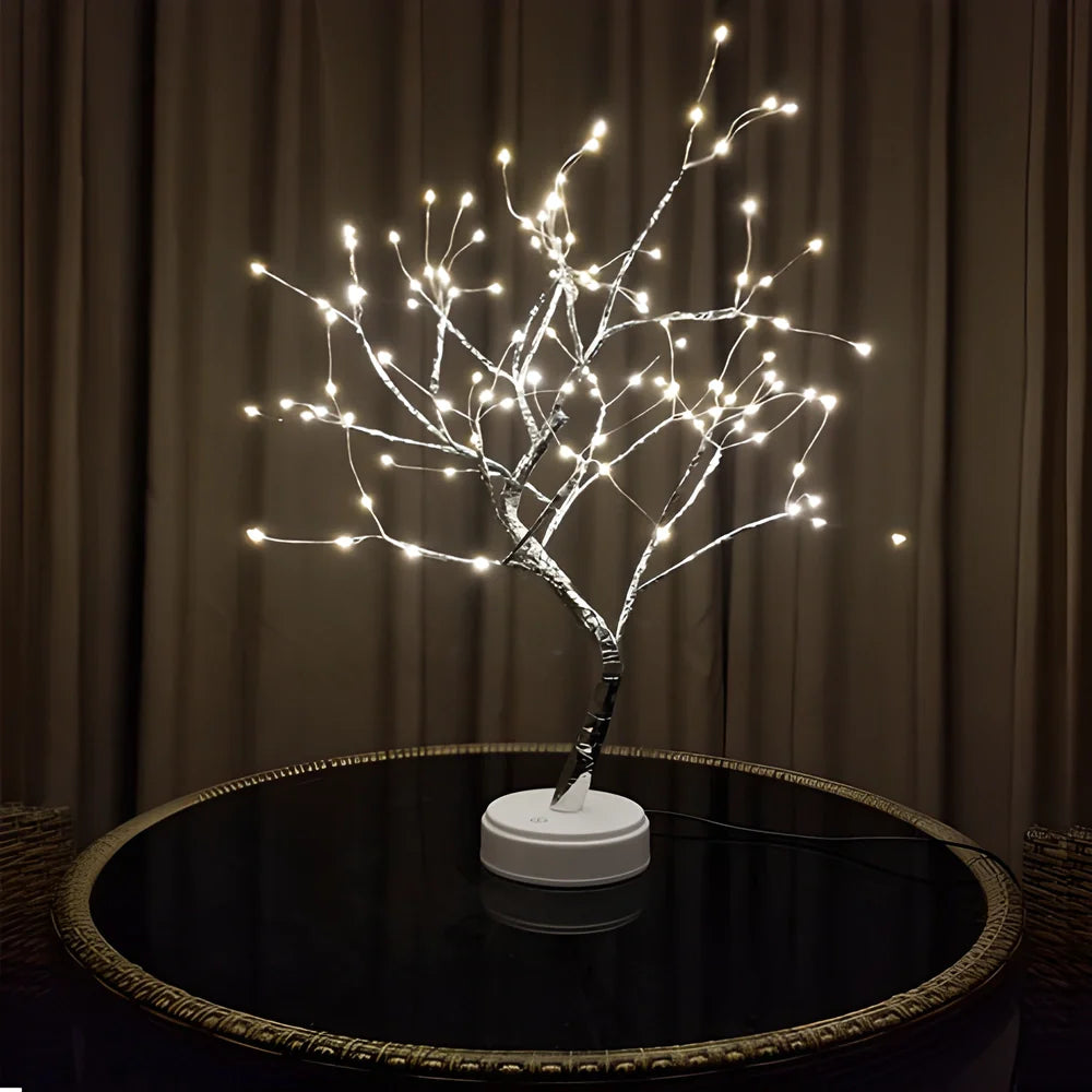 Copper-toned LED light tree with adjustable branches, providing a warm, glowing ambiance for any home decor