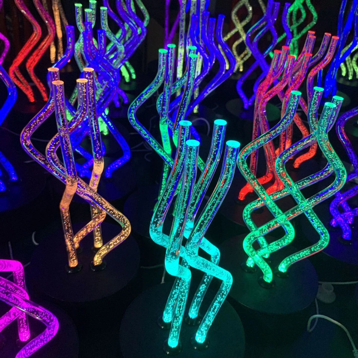 Colorful acrylic table lamp with dancing light display, 7 color-changing modes, and USB or battery power options