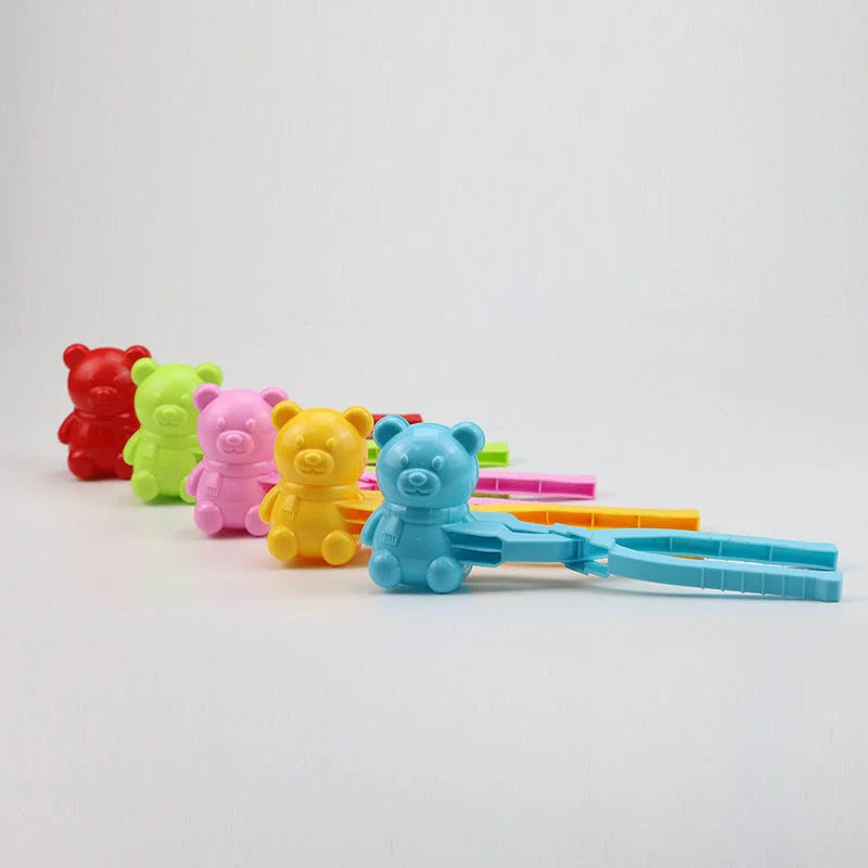 Heart-shaped snowball maker for kids in red, green, pink, yellow, and blue