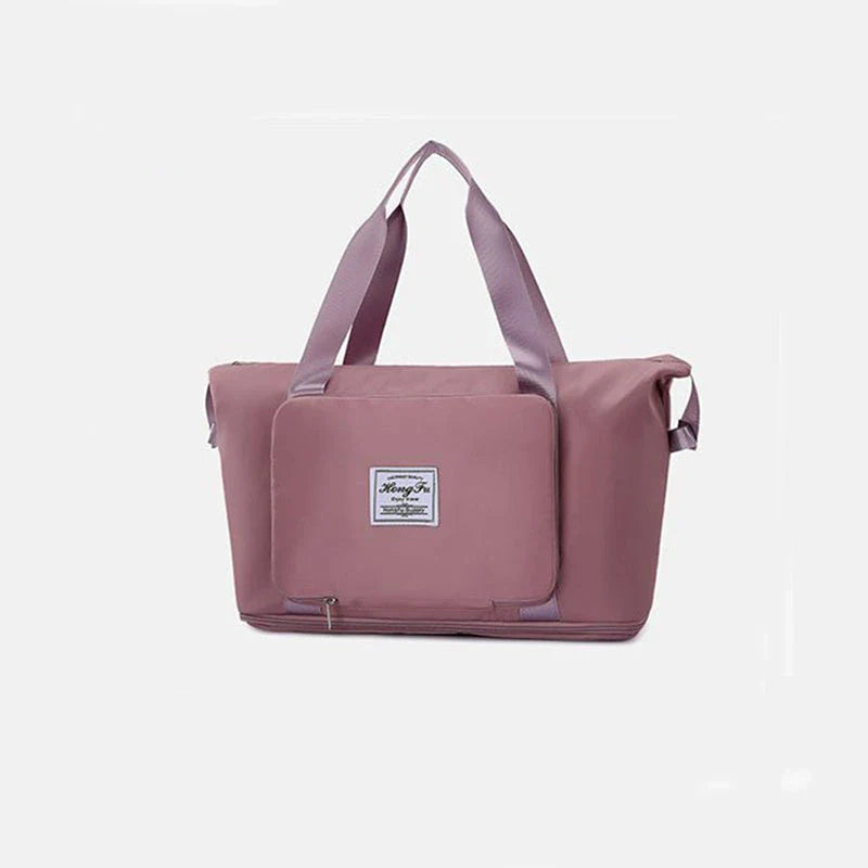 Expandable travel duffel bag with adjustable shoulder strap, multiple interior pockets, and water-resistant Oxford cloth material