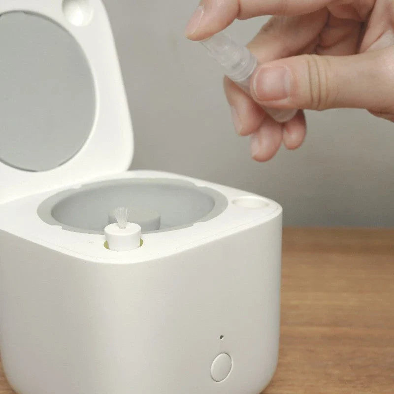 Automatic earbuds cleaning kit for AirPods, featuring a specialized chamber and cleaning mechanisms to thoroughly remove dirt and wax buildup