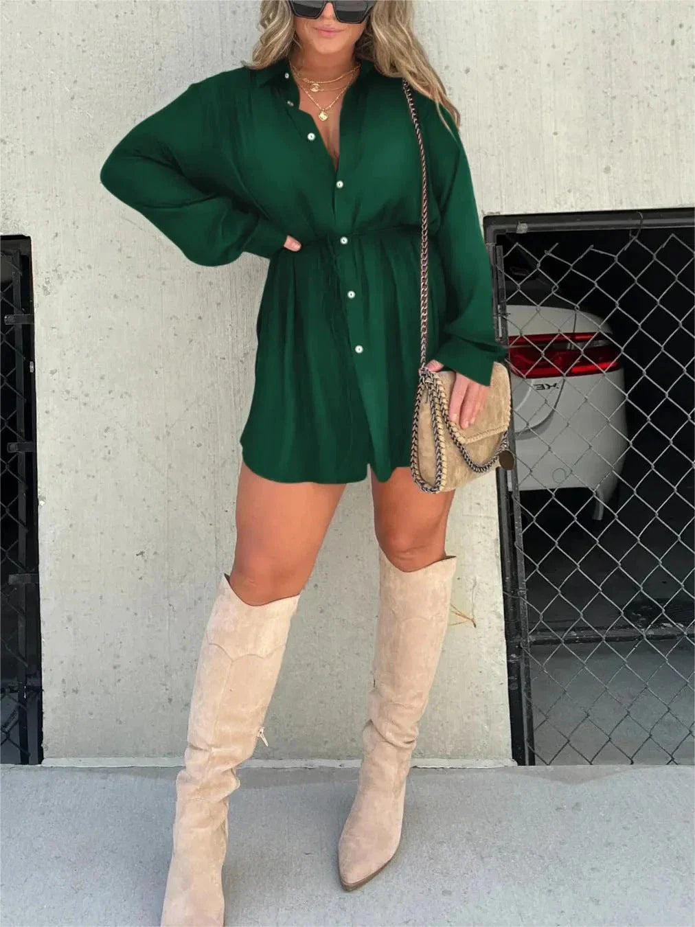 Women's long sleeve jumpsuit with button accents in various vibrant colors