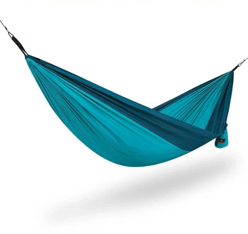 Premium double hammock for outdoor camping and hunting, made with soft, breathable fabric and reinforced climbing ropes