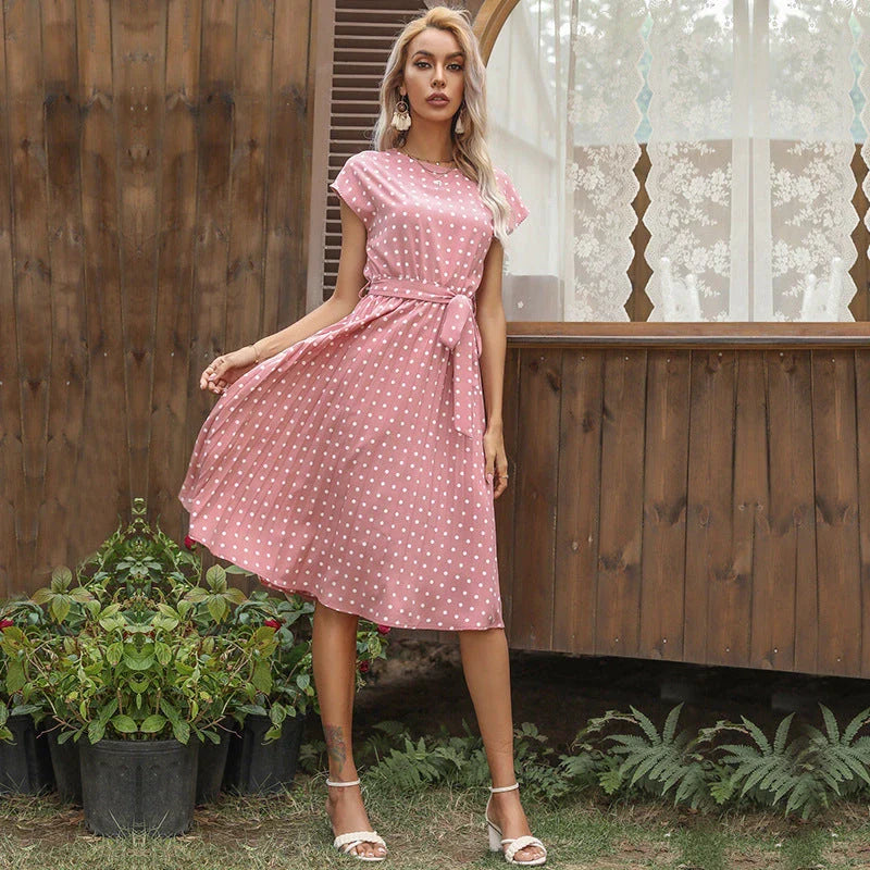 Stylish polka dot midi dress with short sleeves, pleated skirt, and hidden lining for a smooth, non-see-through fit