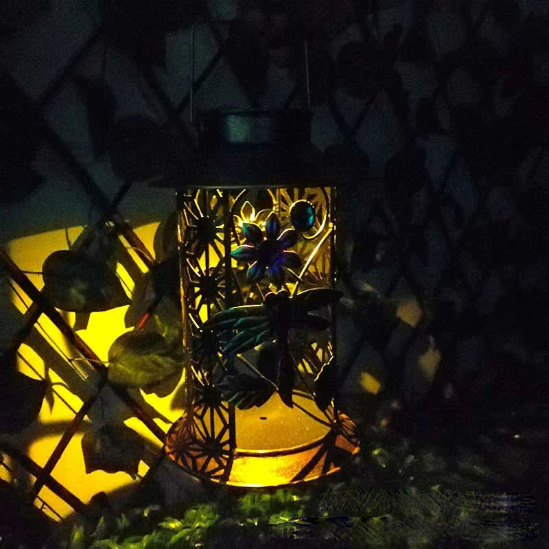 Decorative solar-powered garden lamp with iron construction and classic European design for outdoor lighting and decor