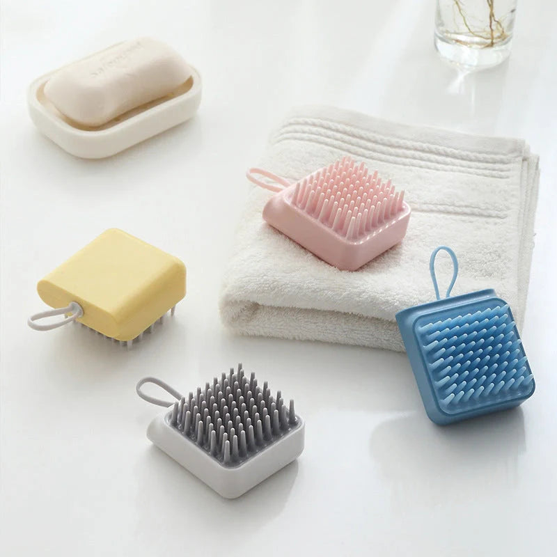 Soft TPR Pet Bath Massage Brush for dogs and cats in white, pink, blue, and yellow