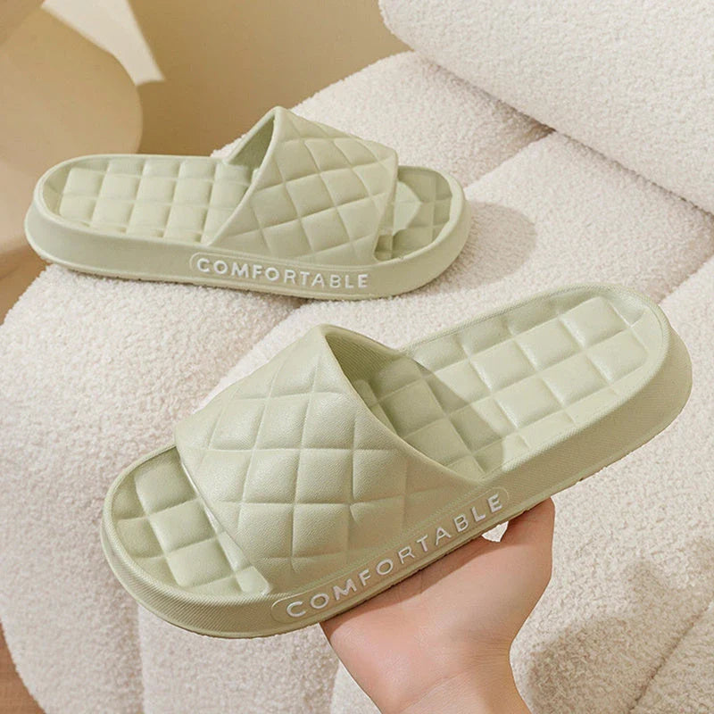 Cozy plaid indoor slippers with soft, silent, and waterproof EVA construction for comfortable all-day wear