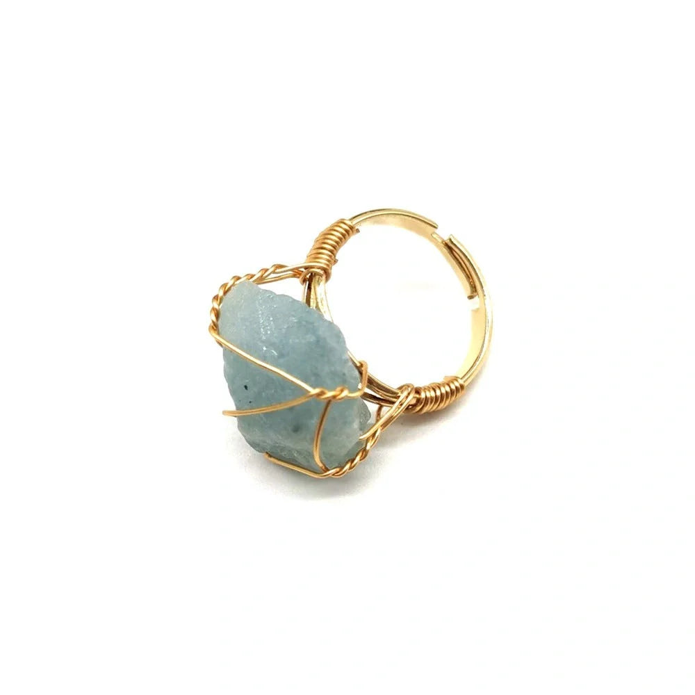 Handcrafted agate stone ring featuring an array of natural gemstones in various colours, with an adjustable design for a customized fit.