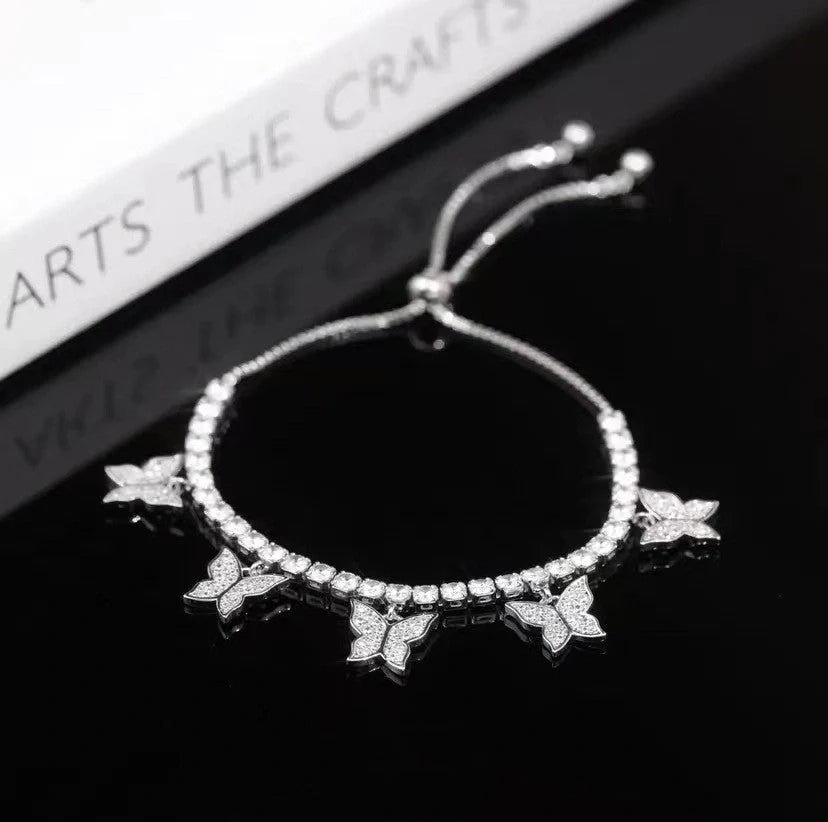 Adjustable Multi Butterfly Bracelet with zircon stones on a heart-shaped copper band