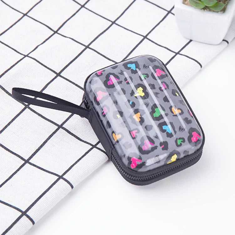 Tinplate coin purse with anime-inspired cartoon graphics, available in various stylish designs